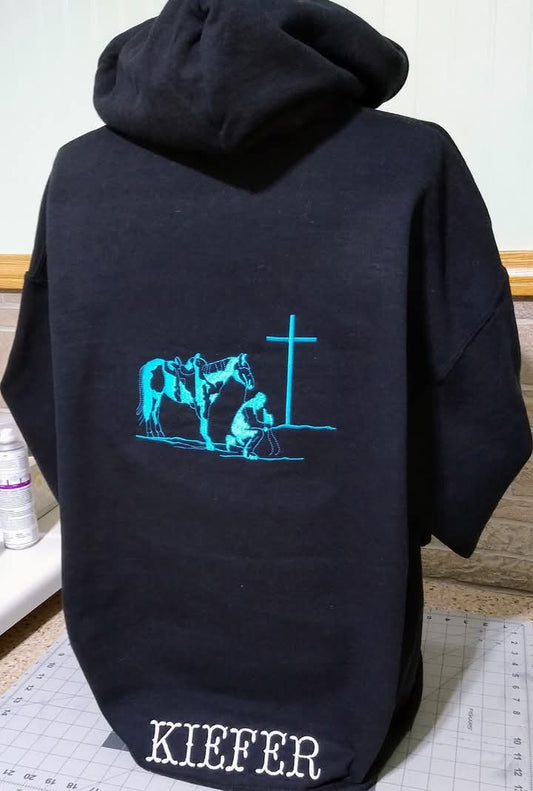 Cowboy Kneeling at Cross Hooded Sweatshirt